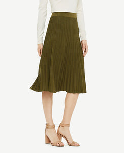 A hint of shimmer adds sparkling personality to our prettily pleated sweater skirt. Encased elastic waistband. 25 front length; 25 1/2 back length.