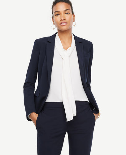 Get the job done in style with this flattering seasonless stretch jacket - an office-ready look that works overtime. Notched lapel. Long button-open sleeves allow for versatility in styling. One-button front. Angled chest welt pocket. Front flap besom pockets. Back vent. Lined. 22 long.