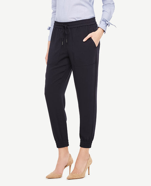 Our conveniently pocketed joggers are a relaxed-yet-polished essential that go the distance. Encased elastic waistband with tunneled drawstring self ties. Front off-seam pockets. Back patch pockets. Encased elastic hem. 26 inseam.