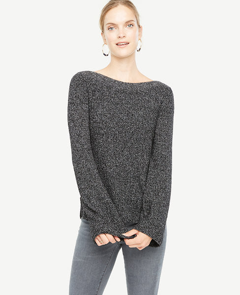 Elongated fluted sleeves make this soft wool cotton sweater perfect for cozying up to - weekday to weekend. Ribbed boatneck. Long sleeves. Side slits. 23 long.