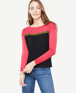 Graphic blocking and bold contrast colors define this modernist style in extrafine merino wool. Boatneck. Long sleeves. Drop shoulders. Side slits. Ribbed cuffs. 23 long.