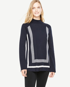 Meet your real-life uniform: this is Luxewear. Every day. Every wear. A flattering mock neck and longer length make this extrafine merino wool sweater a wardrobe must. Mock neck. Long raglan sleeves. Side slits. Ribbed neckline and hem. 27 long.