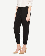 Our conveniently pocketed joggers are a relaxed-yet-polished essential that go the distance. Encased elastic waistband with tunneled drawstring self ties. Front off-seam pockets. Back patch pockets. Encased elastic hem. 26 inseam.