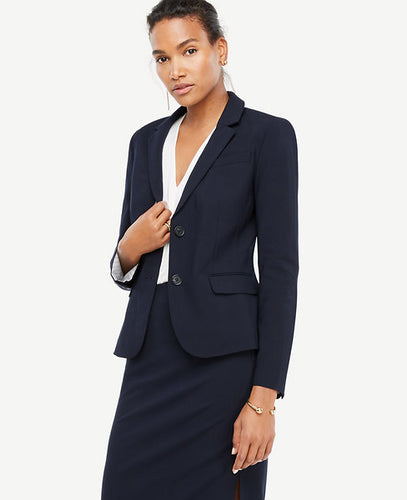 Get the job done in style with this flattering seasonless stretch jacket - an office-ready look that works overtime. Notched lapel. Long button-open sleeves allow for versatility in styling. Two-button front. Angled chest welt pocket. Front flap besom pockets. Back vent. Lined. 23 long.