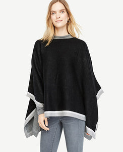 Our contrast-tipped cape adds new levels of refinement to every look.