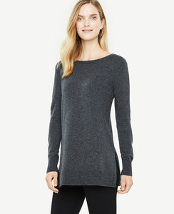 Cozy yet lightweight - and tremendously flattering - our wool blend tunic is cut with deep side slits for a relaxed-meets-refined silhouette. Boatneck. Long sleeves. Side slits. Ribbed cuffs and hem. 29 long.
