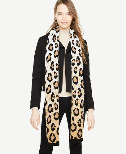 Our cozy blanket scarf features a wildly refined cheetah print that plays up any ensemble. 15 x 82.