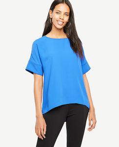 Meet your real-life uniform: this is Luxewear. Every day. Every wear. Contrast stitching and an elliptical hem take this defined tee a notch above. Jewel neck. Short sleeves. Hidden back zipper with hook-and-eye closure. Elliptical hem. 21 3/4 front length; 28 back length.