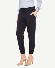 Our conveniently pocketed joggers are a relaxed-yet-polished essential that go the distance. Encased elastic waistband with tunneled drawstring self ties. Front off-seam pockets. Back patch pockets. Encased elastic hem. 29 inseam.