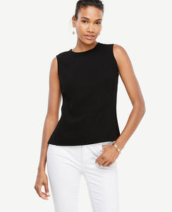 We've crafted our doubleweave shell with piped side panels and side vents for a beautifully structured look. Jewel neck. Sleeveless. Side vents. Hidden back zipper with hook-and-eye closure. Lined. 23 3/4 long.